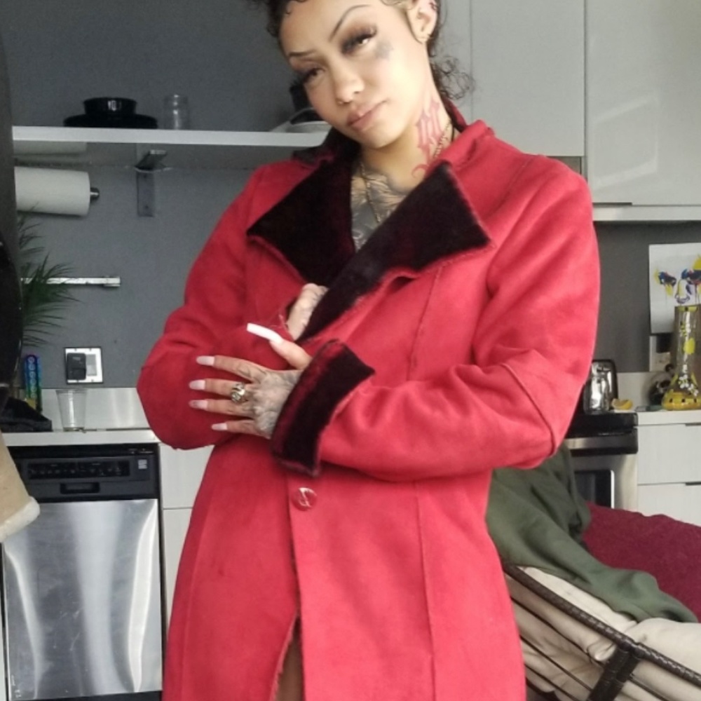 Winter leather coat with exposed seams